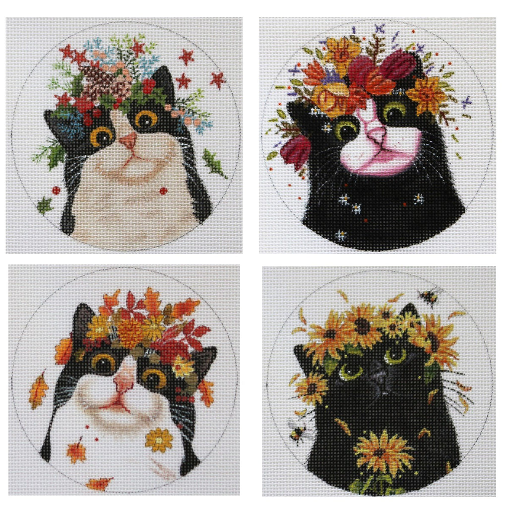 Four Seasonal Cat ornaments by Vicky Mount