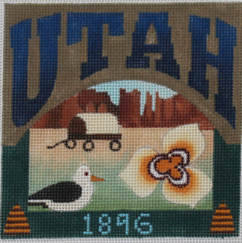 A Denise DeRusha needlepoint canvas of Utah. The design has been  handpainted onto 18 mesh mono Zweigart needlepoint canvas and measures  4.75 x 4.75. It is sold canvas-only or with threads. –