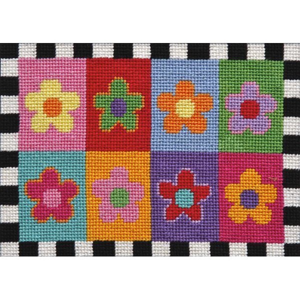 An easy beginner needlepoint kit designed for Kids of all ages. This canvas  which depicts a two daisies is stitch-painted onto 7 mesh needlepoint canvas  and comes with acrylic threads. – Needlepoint